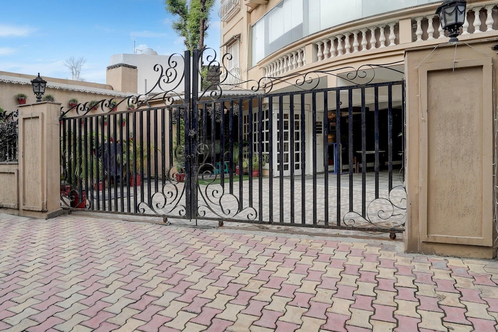 elegant stays with rooftop restro and hill view