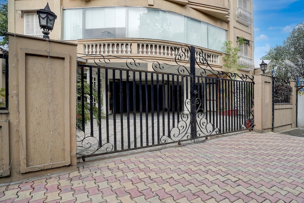 elegant stays with rooftop restro and hill view