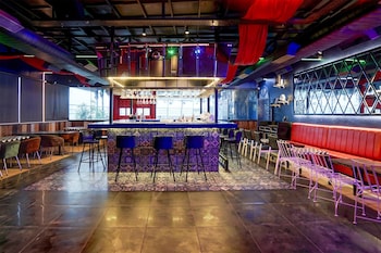 elegant stays with rooftop restro and hill view