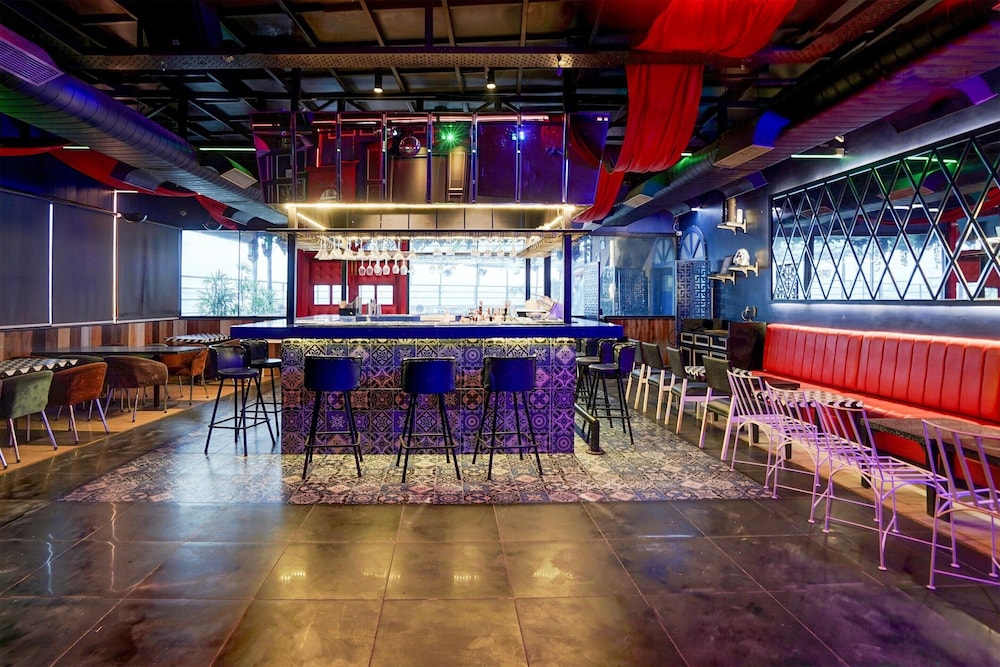 elegant stays with rooftop restro and hill view