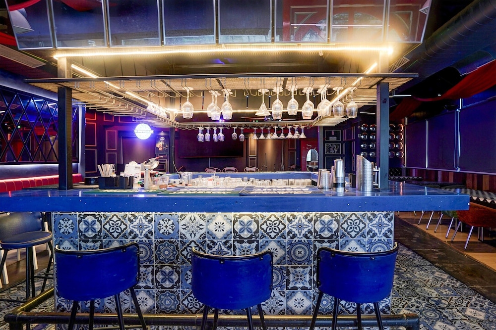 elegant stays with rooftop restro and hill view