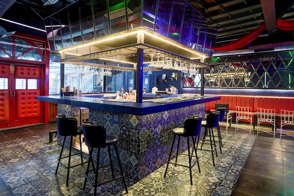 elegant stays with rooftop restro and hill view