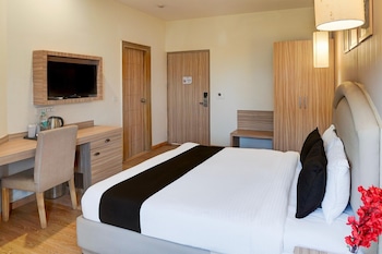 elegant stays with rooftop restro and hill view