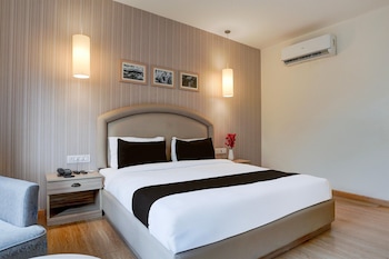 elegant stays with rooftop restro and hill view