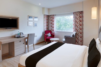 elegant stays with rooftop restro and hill view