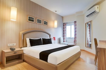 elegant stays with rooftop restro and hill view