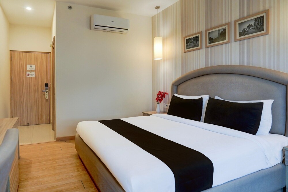 elegant stays with rooftop restro and hill view