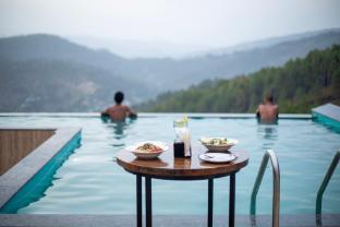 spellmount himalayan view infinity pool resort in kausani