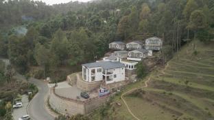 spellmount himalayan view infinity pool resort in kausani