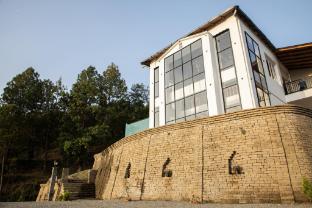 spellmount himalayan view infinity pool resort in kausani
