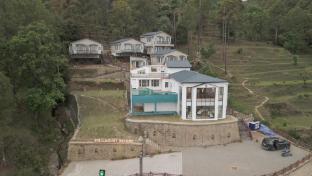spellmount himalayan view infinity pool resort in kausani