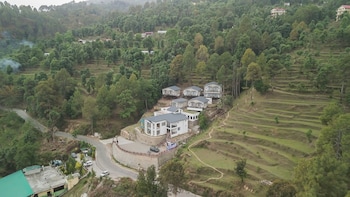 spellmount himalayan view infinity pool resort in kausani