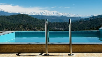 spellmount himalayan view infinity pool resort in kausani