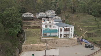 spellmount himalayan view infinity pool resort in kausani