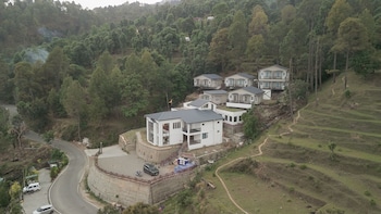 spellmount himalayan view infinity pool resort in kausani
