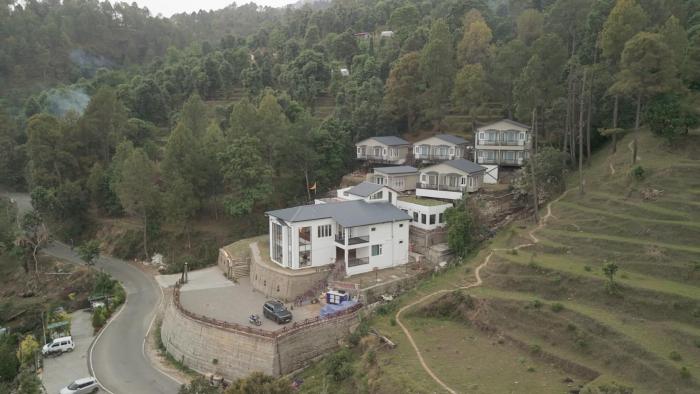 spellmount himalayan view infinity pool resort in kausani