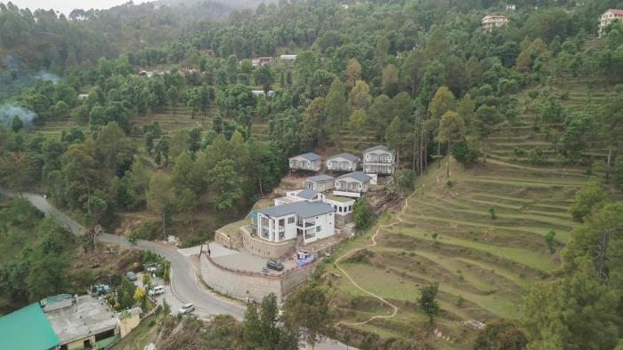 spellmount himalayan view infinity pool resort in kausani