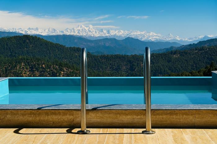 spellmount himalayan view infinity pool resort in kausani
