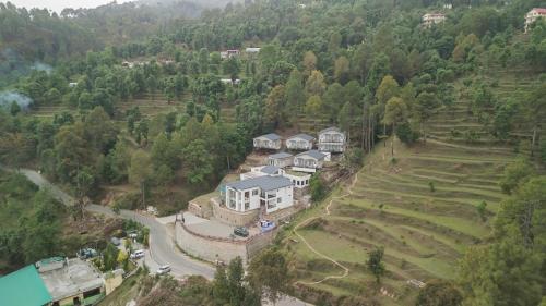 spellmount himalayan view infinity pool resort in kausani