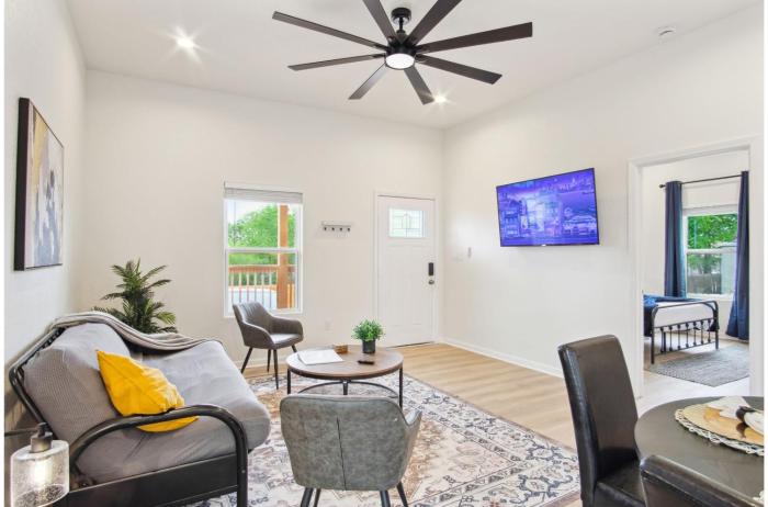 3br 2ba cityscape haven with panoramic tower view