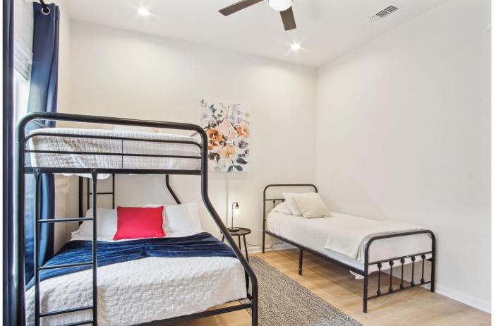 3br 2ba cityscape haven with panoramic tower view