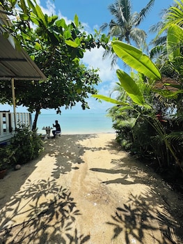beachfront villa with sunset