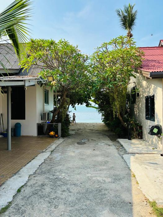 beachfront villa with sunset