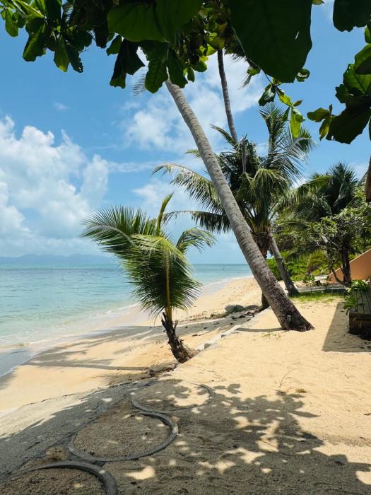 beachfront villa with sunset