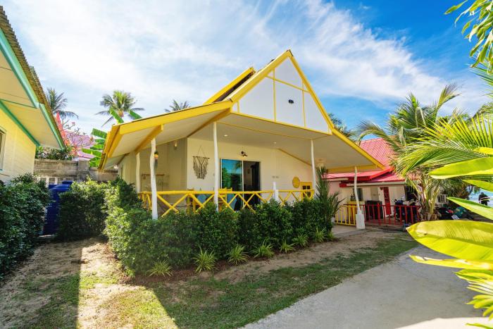 beachfront villa with sunset
