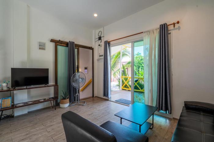 beachfront villa with sunset