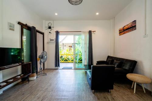 beachfront villa with sunset