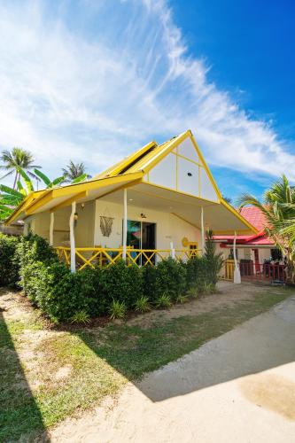 beachfront villa with sunset
