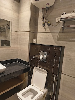 hotel aman suites at igi by arch group