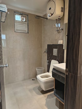 hotel aman suites at igi by arch group