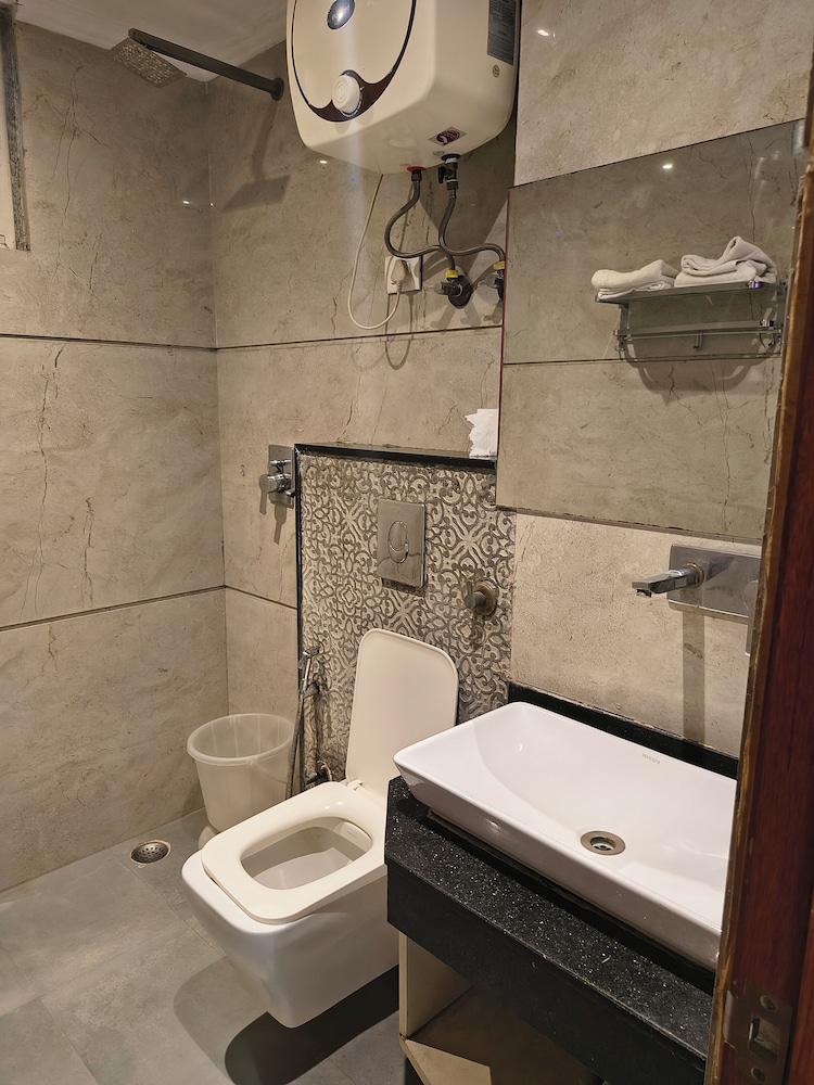hotel aman suites at igi by arch group