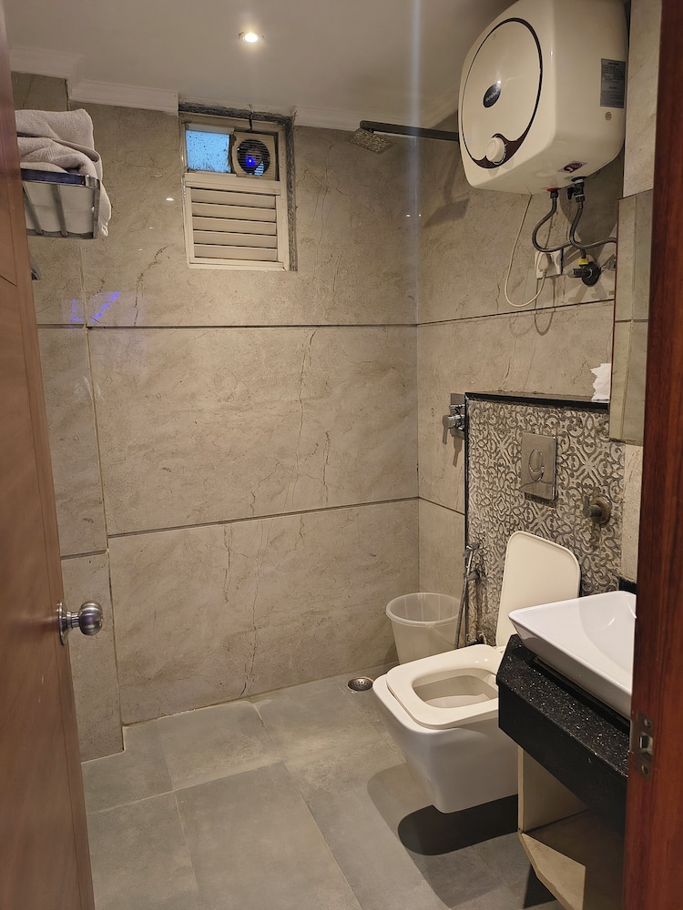 hotel aman suites at igi by arch group