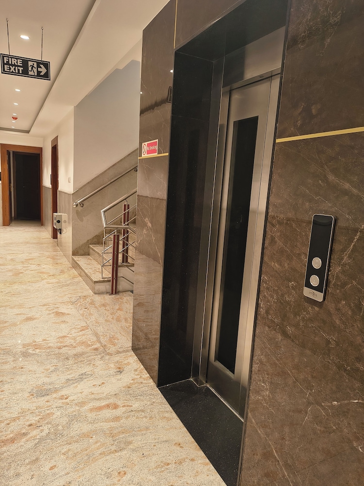 hotel aman suites at igi by arch group