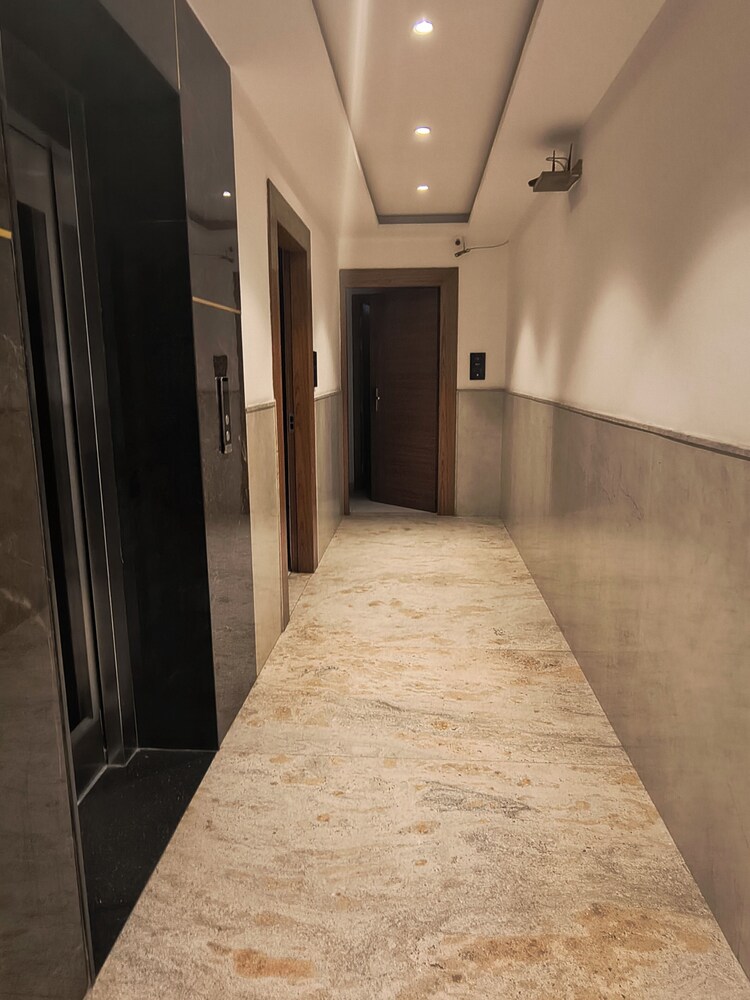 hotel aman suites at igi by arch group