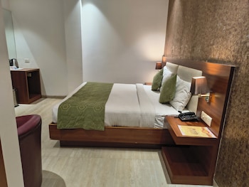 hotel aman suites at igi by arch group