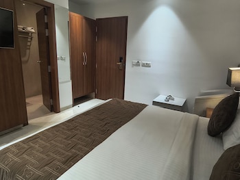 hotel aman suites at igi by arch group