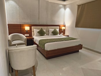 hotel aman suites at igi by arch group
