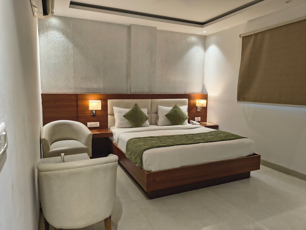 hotel aman suites at igi by arch group