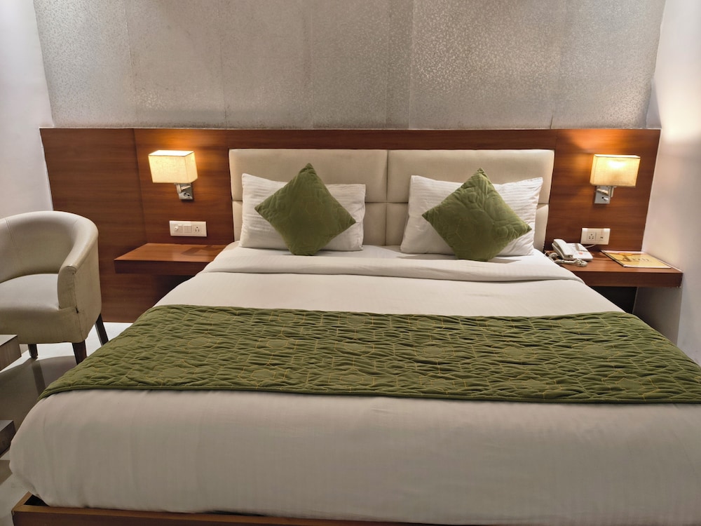 hotel aman suites at igi by arch group