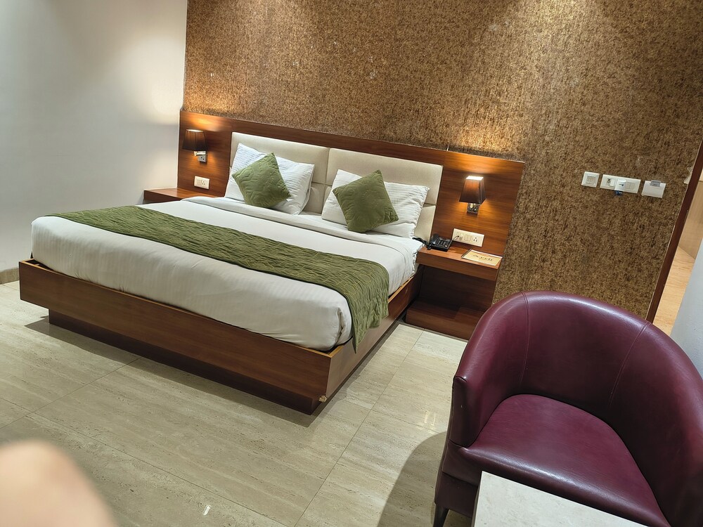 hotel aman suites at igi by arch group
