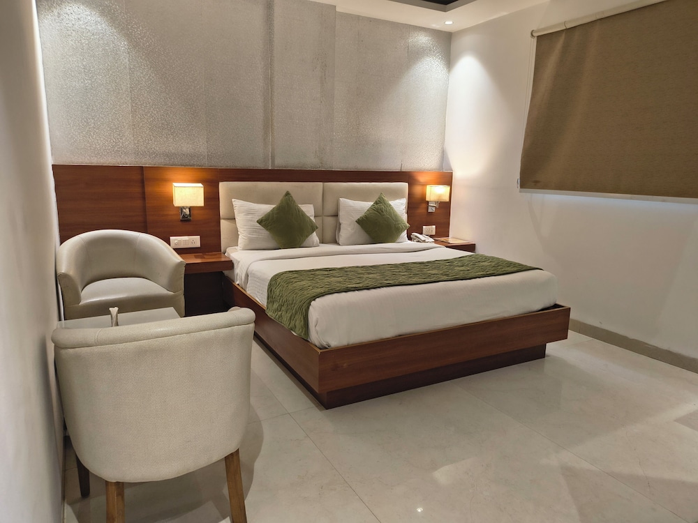 hotel aman suites at igi by arch group
