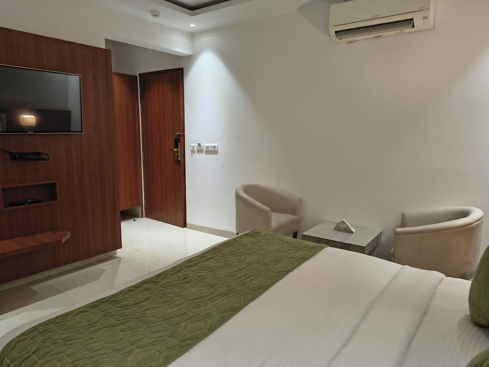 hotel aman suites at igi by arch group