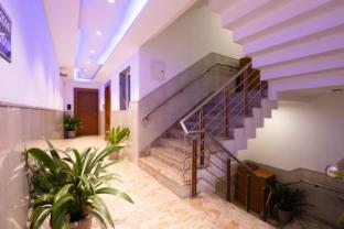 hotel aman suites at igi by arch group