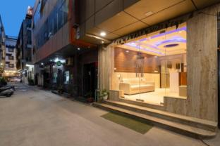 hotel aman suites at igi by arch group