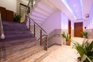 hotel aman suites at igi by arch group