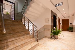 hotel aman suites at igi by arch group